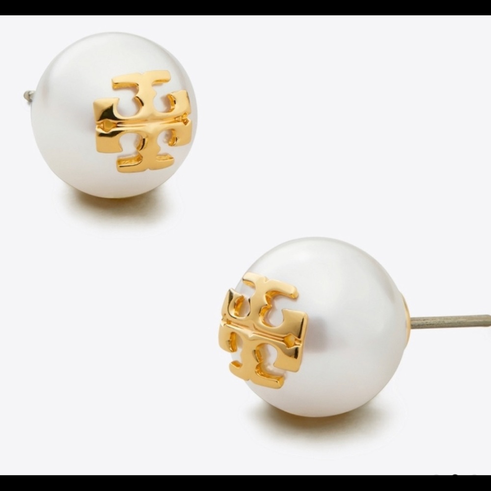 Tory Burch pearl stud earrings.